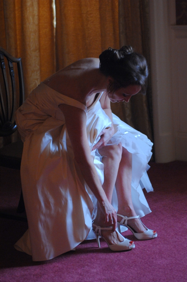 Paula getting ready - putting her shoes on in her suite at Luton Hoo